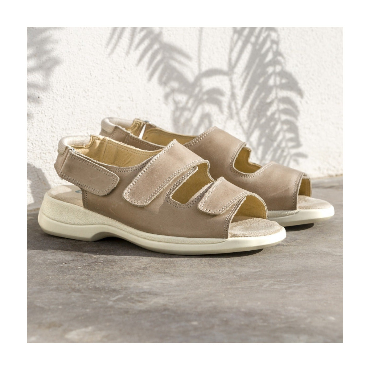 Sunny. A contemporary looking sandal with triple fastenings
